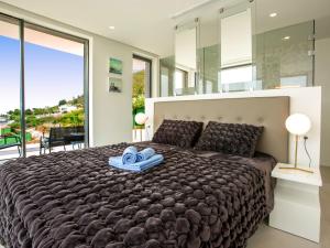 Postel nebo postele na pokoji v ubytování Villa Villa Atina by Interhome