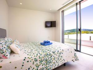 Postel nebo postele na pokoji v ubytování Villa Villa Atina by Interhome