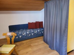 Posteľ alebo postele v izbe v ubytovaní Apartment Frieda by Interhome