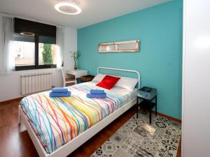เตียงในห้องที่ Apartment Ancora by Interhome