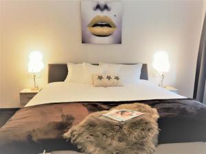 Llit o llits en una habitació de Apartment Enzian - Zürcher by Interhome