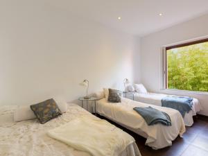 Łóżko lub łóżka w pokoju w obiekcie Apartment Grace by Interhome