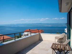 a balcony with a view of the ocean at Holiday Home Villa Vali 2 by Interhome in Vrbnik