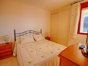 Postel nebo postele na pokoji v ubytování Apartment Amatista 09 by Interhome