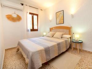 Postel nebo postele na pokoji v ubytování Holiday Home La Marina by Interhome