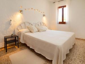 Postel nebo postele na pokoji v ubytování Holiday Home La Marina by Interhome