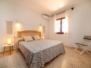 Postel nebo postele na pokoji v ubytování Holiday Home La Marina by Interhome