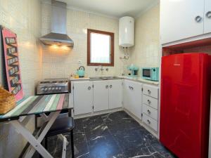 Kuchyň nebo kuchyňský kout v ubytování Holiday Home La Marina by Interhome