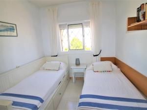 Posteľ alebo postele v izbe v ubytovaní Holiday Home Alkabir playa by Interhome