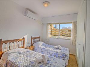 Posteľ alebo postele v izbe v ubytovaní Apartment Apolo IV-12 by Interhome