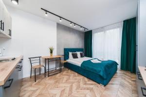 Łóżko lub łóżka w pokoju w obiekcie Ice Apartments