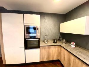 Kuchyň nebo kuchyňský kout v ubytování Wood Luxury House
