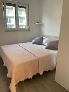 Posteľ alebo postele v izbe v ubytovaní Apartment LJUBICA