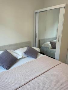 Posteľ alebo postele v izbe v ubytovaní Apartment LJUBICA