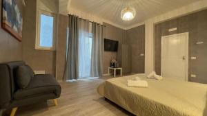 TV a/nebo společenská místnost v ubytování Cconforthotels R&B Gary House + 15 fotografií