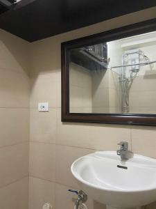 A bathroom at Taal Lake View Wind Residences by SMCo
