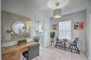 a living room with a mirror and a table at Updated Jackson Home about 3 Mi to JSU Stadium! in Jackson
