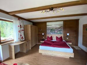 Postel nebo postele na pokoji v ubytování Haus Alpina