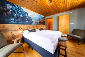 Ένα ή περισσότερα κρεβάτια σε δωμάτιο στο Bergmoment