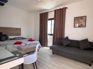 Posteľ alebo postele v izbe v ubytovaní Exclusiva Villa de Lujo (5*****) en Corralejo - Fuerteventura (Islas Canarias)