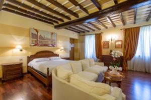 Postel nebo postele na pokoji v ubytování Hotel Antica Dogana + 37 fotografií