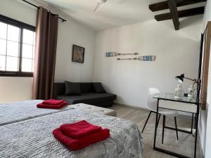 Posteľ alebo postele v izbe v ubytovaní Exclusiva Villa de Lujo (5*****) en Corralejo - Fuerteventura (Islas Canarias)