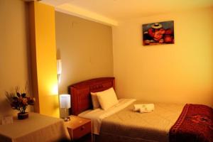Letto o letti in una camera di Hotel Wayra Dreams