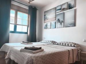 Posteľ alebo postele v izbe v ubytovaní Exclusiva Villa de Lujo (5*****) en Corralejo - Fuerteventura (Islas Canarias)