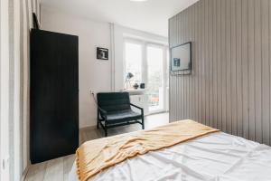 Posteľ alebo postele v izbe v ubytovaní Nocosfera Apartament Górnośląski