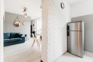 Kuchyňa alebo kuchynka v ubytovaní Nocosfera Apartament Górnośląski