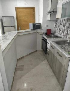 Virtuvė arba virtuvėlė apgyvendinimo įstaigoje A modern apartment 2 Rooms