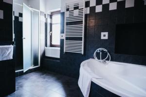 Posteľ alebo postele v izbe v ubytovaní Hotel Centrum
