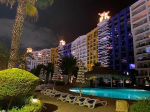The swimming pool at or close to Porto Marina Resort Chalets Families Only