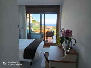 Posteľ alebo postele v izbe v ubytovaní impresionantes vistas en Baiona