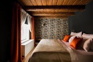 Postel nebo postele na pokoji v ubytování Hotel Nerudova 211