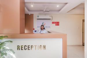 Vstupní hala nebo recepce v ubytování Capital O Orbit Inn Near Infiniti Mall