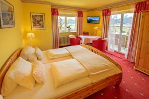 Postel nebo postele na pokoji v ubytování Appartements Kaiserblick