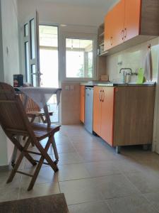 Η κουζίνα ή μικρή κουζίνα στο Sea view house Zagradje