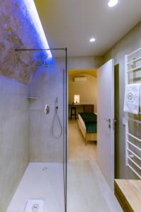 Postel nebo postele na pokoji v ubytování Iris Luxury Suite