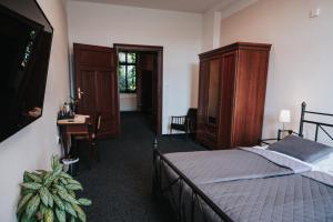 Posteľ alebo postele v izbe v ubytovaní Hotel Centrum