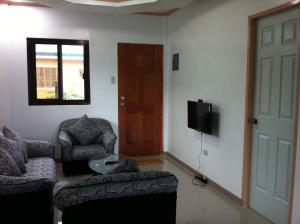 TV a/nebo společenská místnost v ubytování Rullan Apartelle