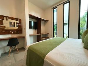 TV a/nebo společenská místnost v ubytování HOTEL KOOKAY VALLADOLID