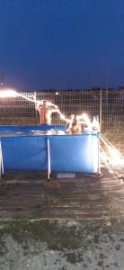 Bazén v ubytování Dă-i pace mai nebo v jeho okolí