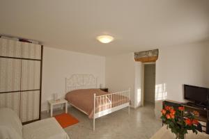 Posteľ alebo postele v izbe v ubytovaní Guesthouse Totićevi