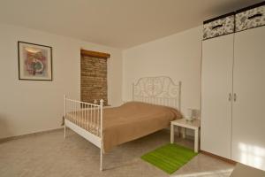 Posteľ alebo postele v izbe v ubytovaní Guesthouse Totićevi + 37 fotografií