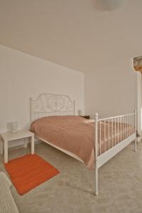 Posteľ alebo postele v izbe v ubytovaní Guesthouse Totićevi