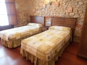 Postel nebo postele na pokoji v ubytování Hostal Virgen de la Encina