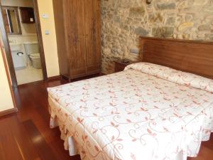 Postel nebo postele na pokoji v ubytování Hostal Virgen de la Encina