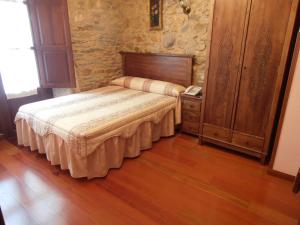 Postel nebo postele na pokoji v ubytování Hostal Virgen de la Encina