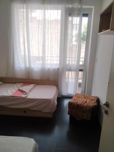 Ένα ή περισσότερα κρεβάτια σε δωμάτιο στο Хаджи Иванов +18 φωτογραφίες